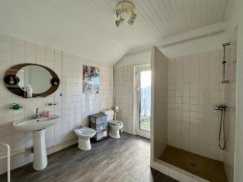 Maison à usage commercial et habitation