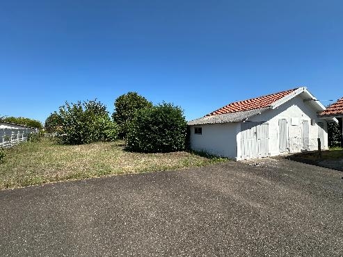 Maison à usage commercial et habitation