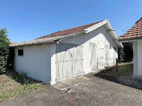 Maison à usage commercial et habitation