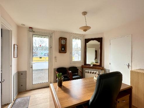 Maison à usage commercial et habitation